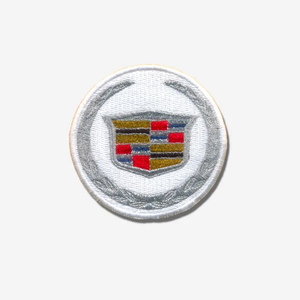 Cadillac Car Logo Embroidered Iron On Patches Cadillac car logo embroidered iron-on patch with detailed stitching and vibrant colors.