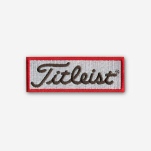 Titleist logo embroidered iron-on patch with premium stitching and clean design.