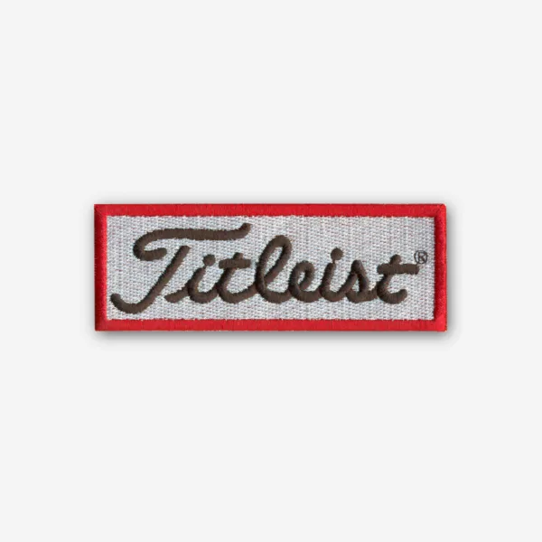 Titleist logo embroidered iron-on patch with premium stitching and clean design.