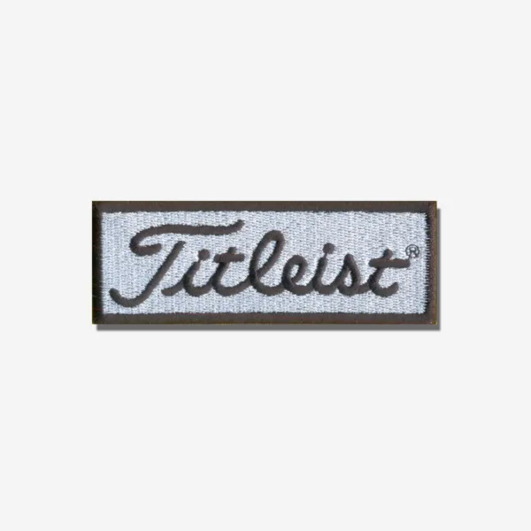 Titleist logo embroidered iron-on patch with premium stitching and clean design.