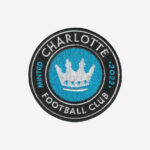Charlotte Football Club embroidered logo patch with crown in blue, black, and white.