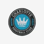 Charlotte Football Club embroidered logo patch with crown in blue, black, and white.