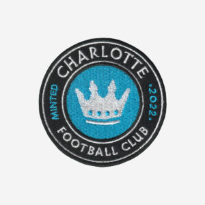 Charlotte Football Club embroidered logo patch with crown in blue, black, and white.