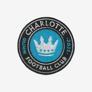 Charlotte Football Club embroidered logo patch with crown in blue, black, and white.