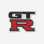Nissan GT-R logo embroidered iron-on patch in red, black, and silver for motorsport apparel.